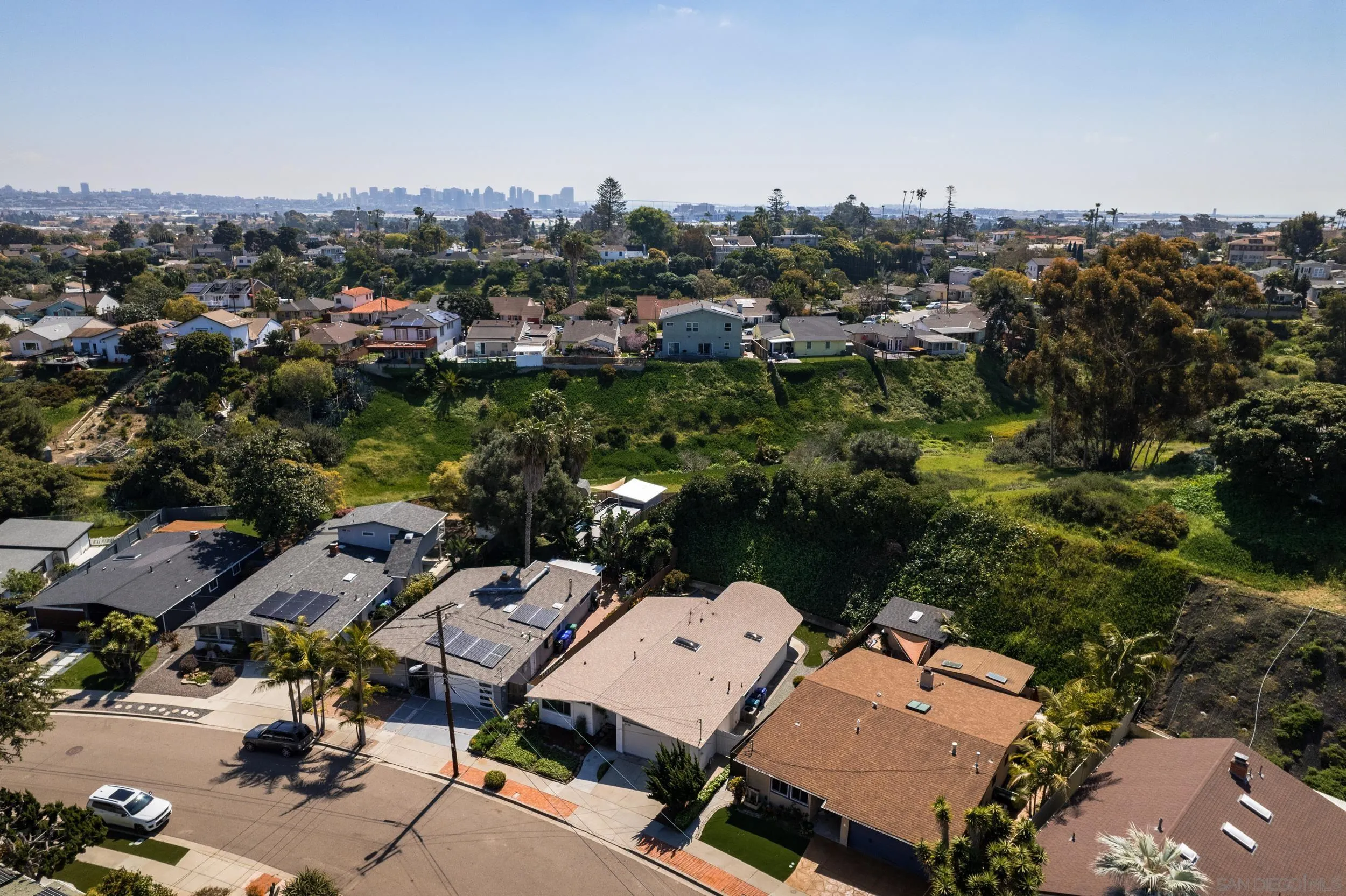 3448 Larga Circle San Diego, CA 92110 - Photo 36 of 36 an aerial view of a city with lots of residential buildings