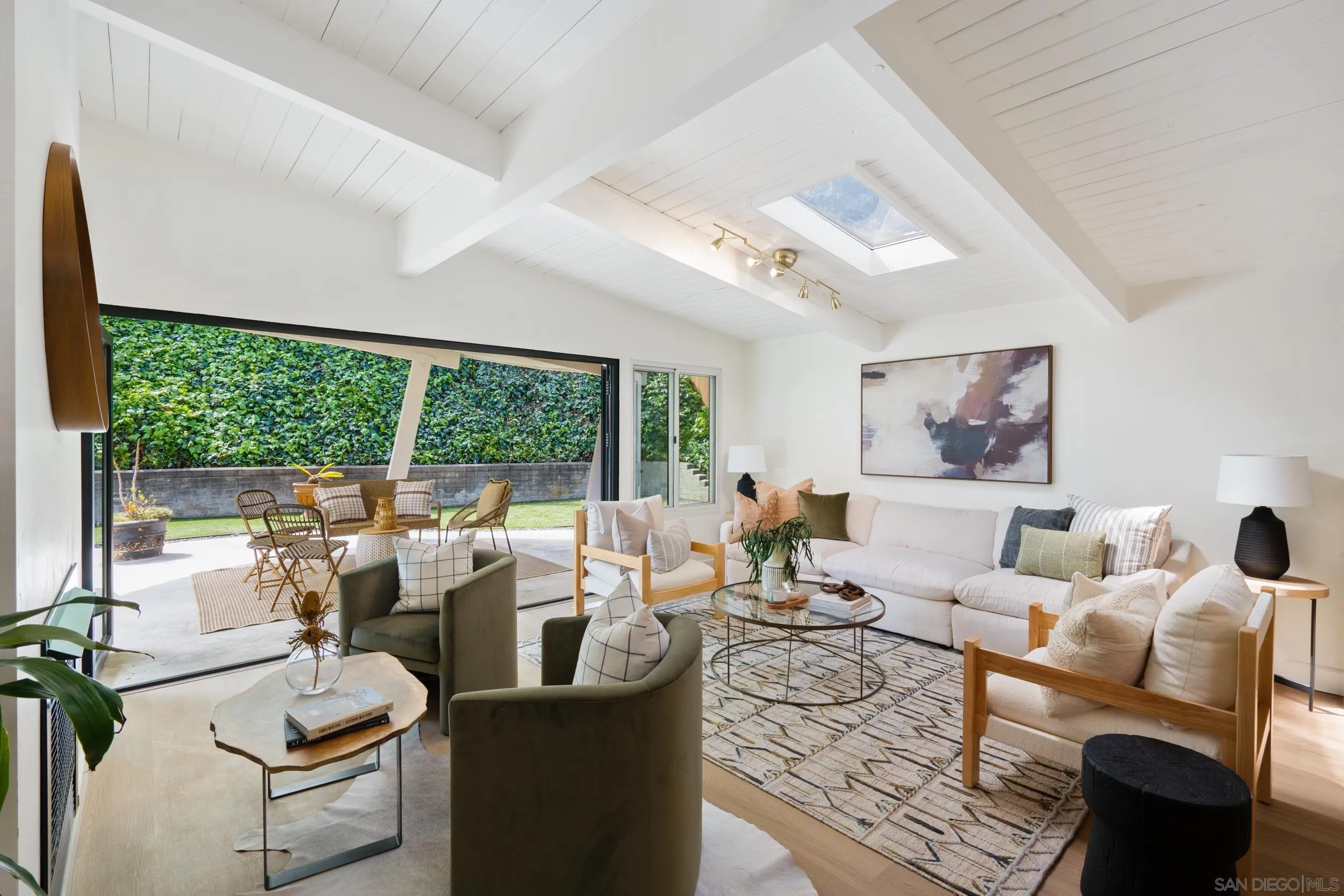 3448 Larga Circle San Diego, CA 92110 - Photo 5 of 36 a living room with furniture and large windows