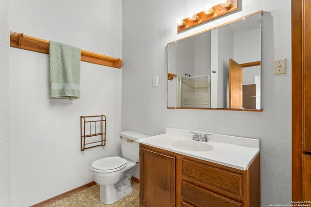 a white bath tub sitting next to a white sink