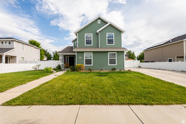 1443 West 250 North Springville, UT 84663 - Photo 2 of 23 Two-story residence with green siding and white trim