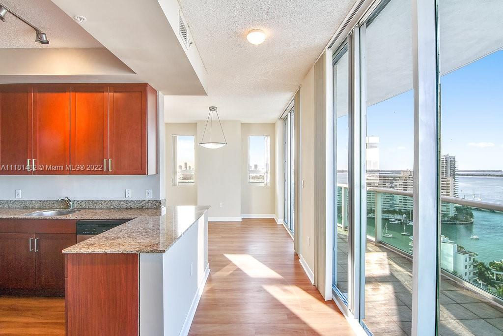 1500 Bay Road, Unit C2312 Miami Beach, FL 33139 - Photo 3 of 20 a view of a kitchen with a sink and a large window