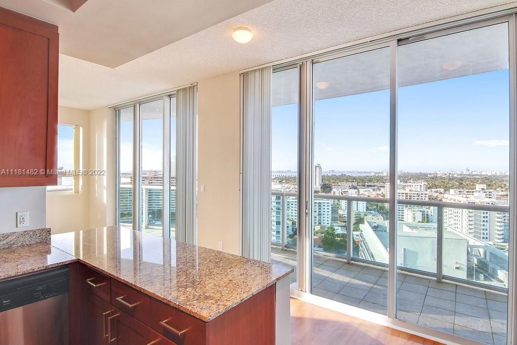 1500 Bay Road, Unit C2312 Miami Beach, FL 33139 - Photo 4 of 20 a view of bathroom with granite countertop sink and tub