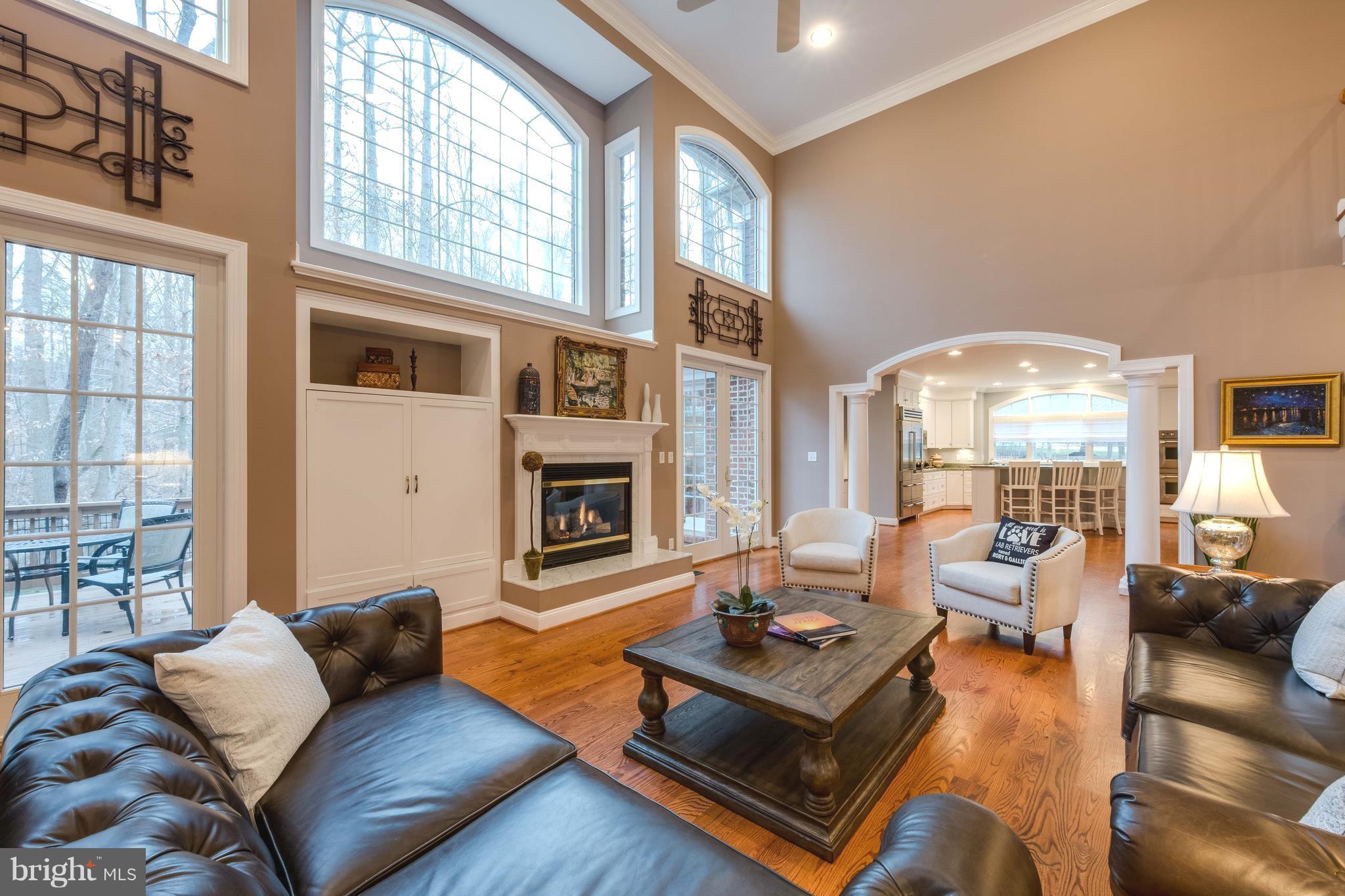 30 Colony Crossing Edgewater, MD 21037 - Photo 3 of 30 Natural gas FP w/ marble hearth,custom built ins.