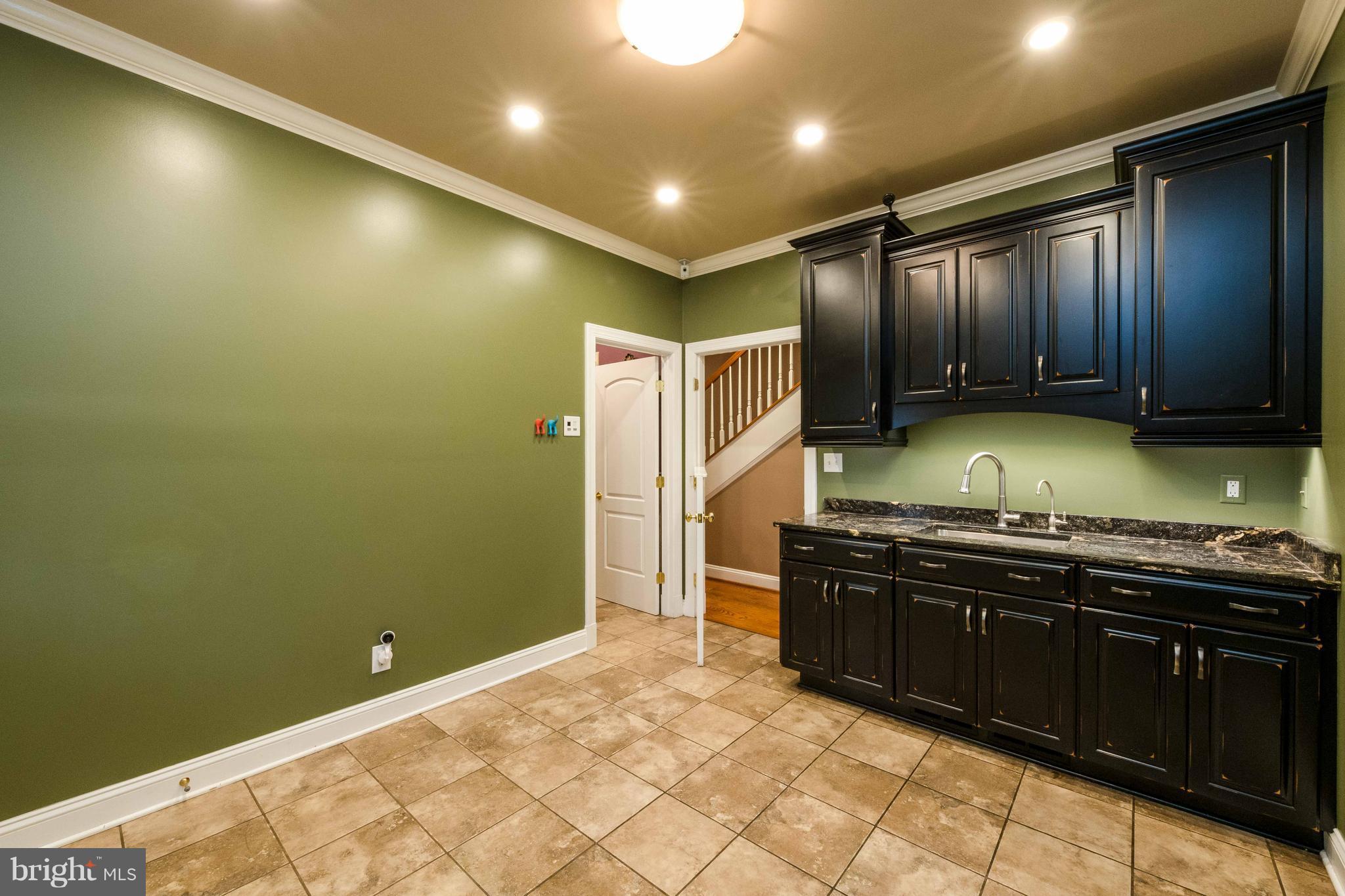 30 Colony Crossing Edgewater, MD 21037 - Photo 28 of 30 Main level all purpose room w/ full bath