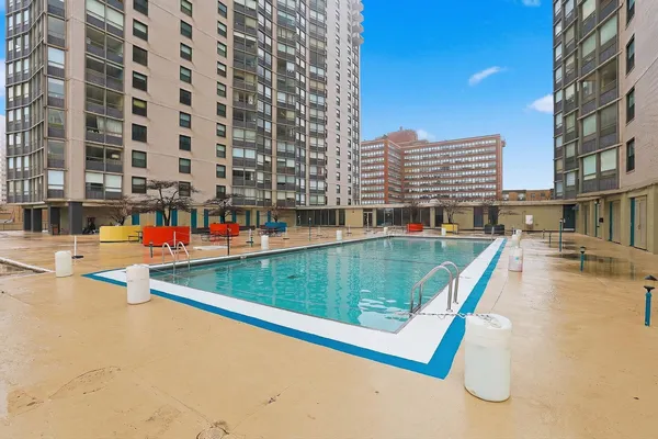 swimming pool with outdoor seating