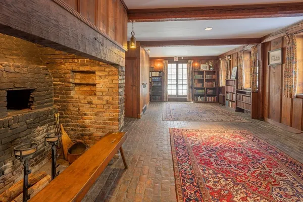 a spacious bathroom with a bathtub and shower