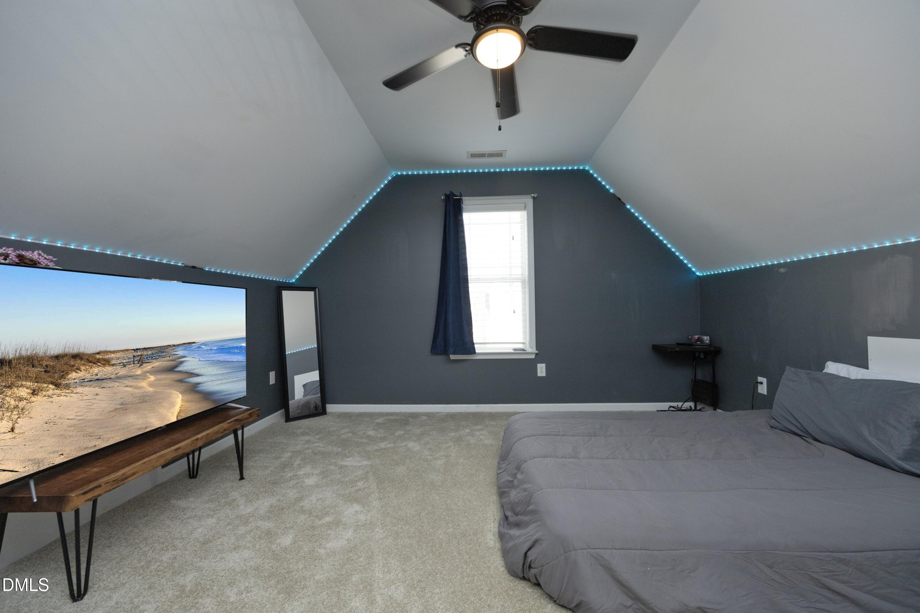 4054 Landover Lane Raleigh, NC 27616 - Photo 22 of 27 a bedroom with furniture and a window