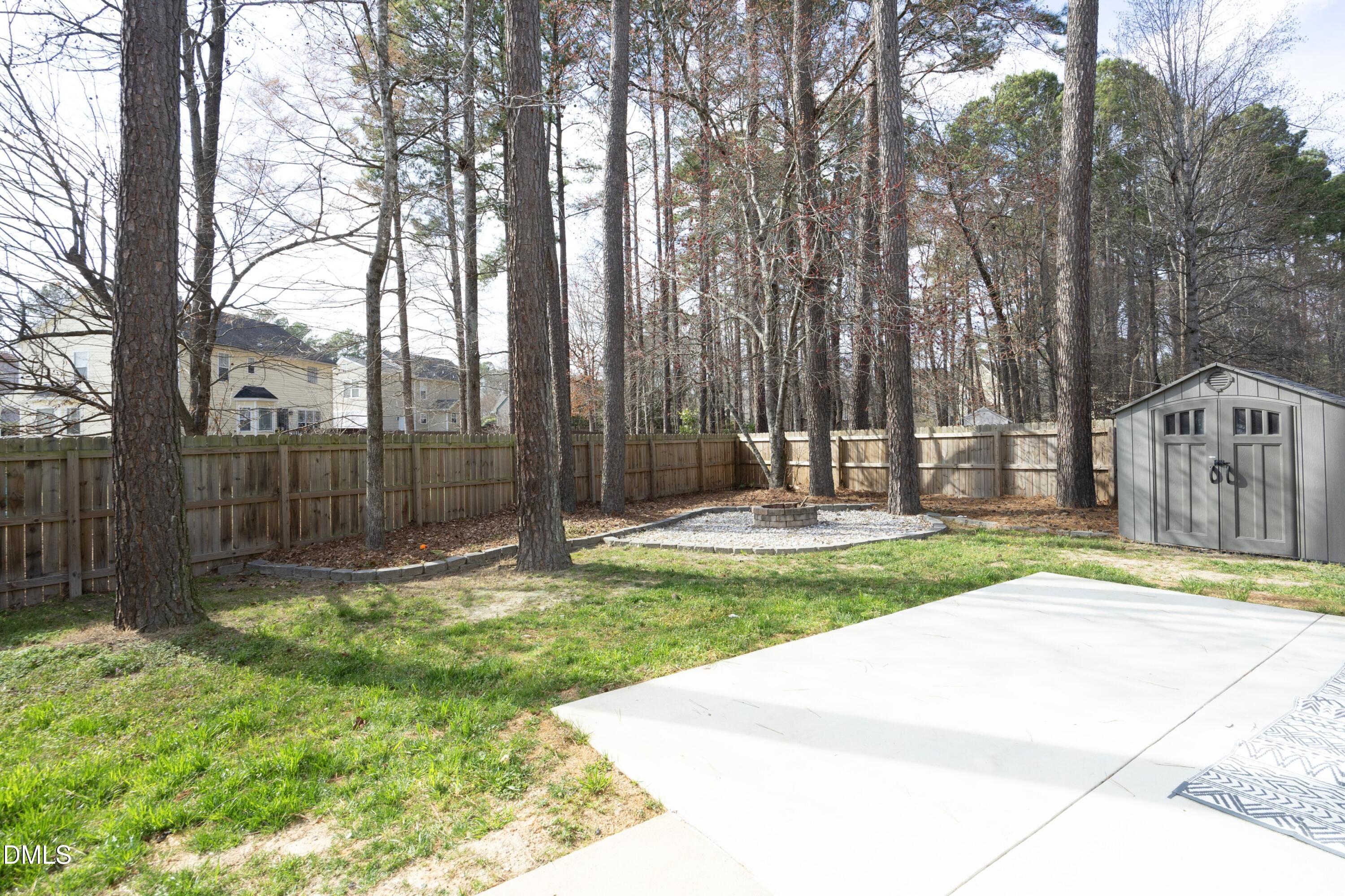 4054 Landover Lane Raleigh, NC 27616 - Photo 24 of 27 a view of a backyard with a small cabin