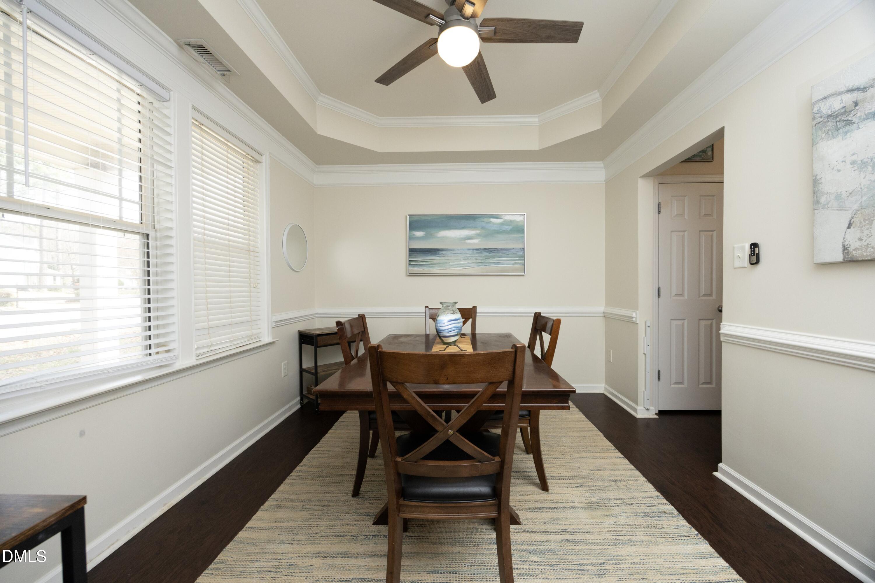 4054 Landover Lane Raleigh, NC 27616 - Photo 5 of 27 a view of a dining room with furniture and a window