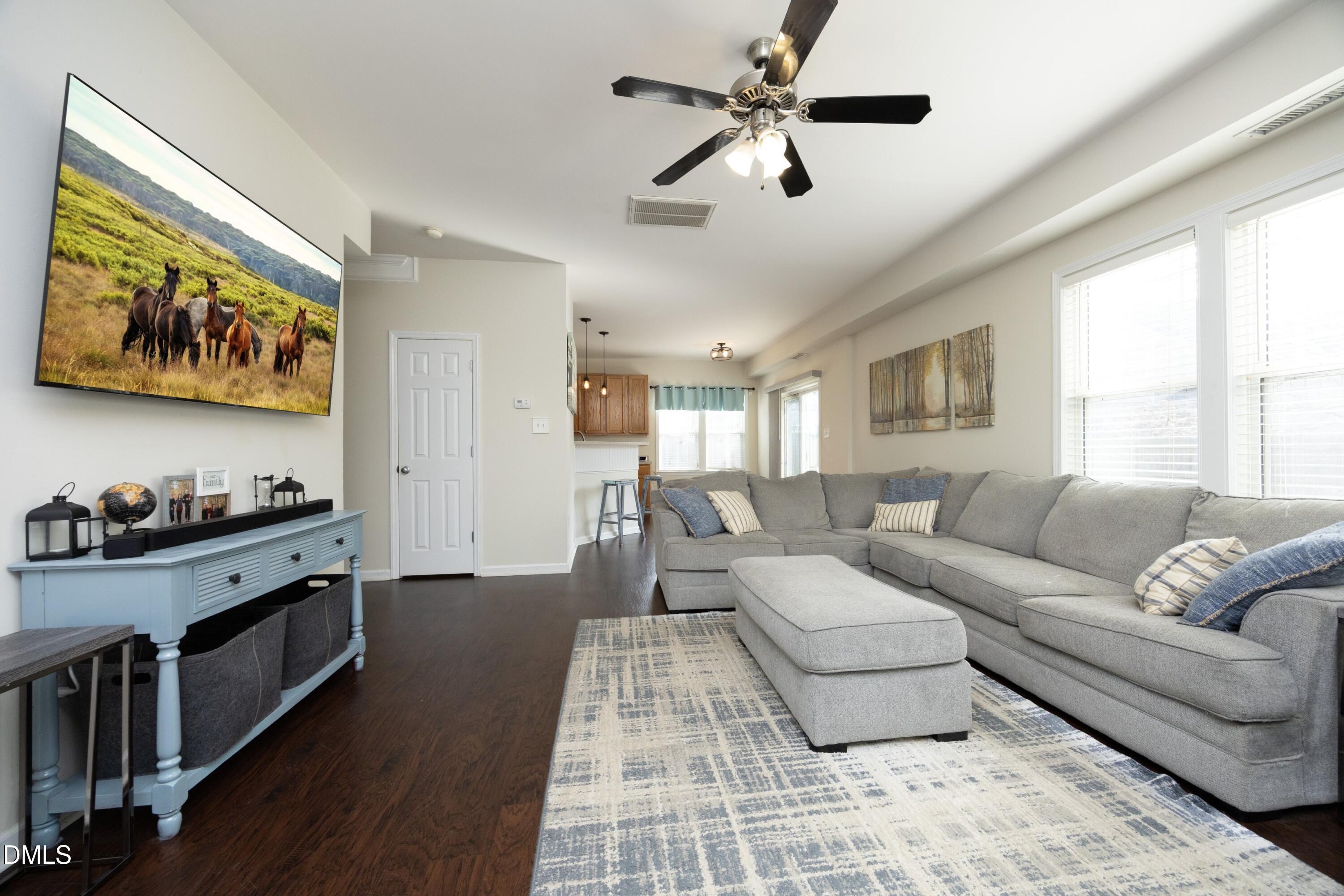 4054 Landover Lane Raleigh, NC 27616 - Photo 8 of 27 a living room with furniture and a window