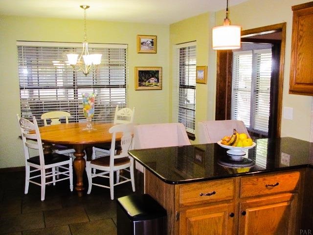 4135 Tronjo Road Pensacola, FL 32503 - Photo 10 of 24 Kitchen opens to large breakfast area