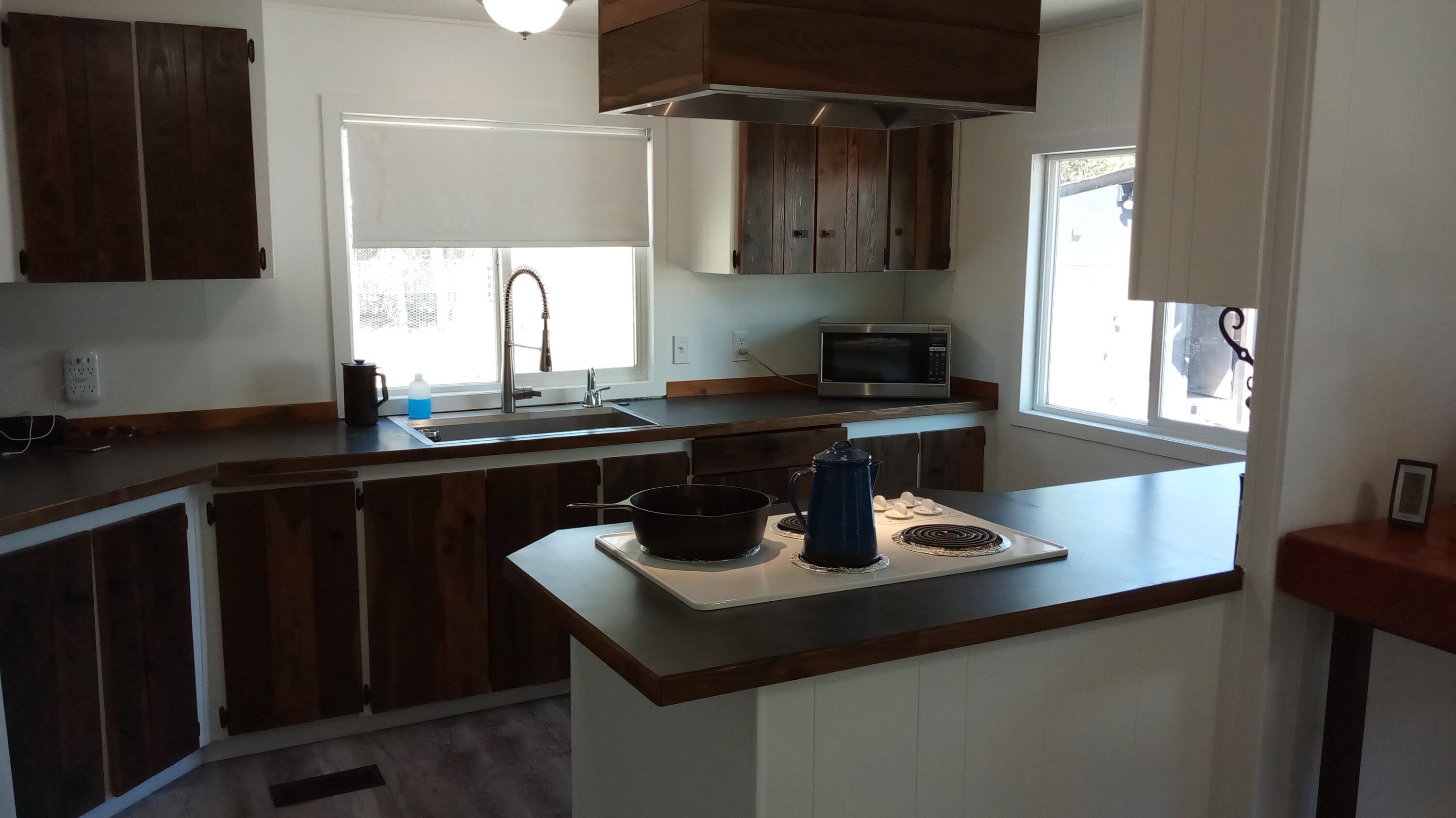 6616 Randy Road La Pine, OR 97739 - Photo 8 of 32 Well appointed kitchen with goose neck faucet, cooktop and vent system