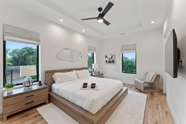 a bed room with a bed and a lamp