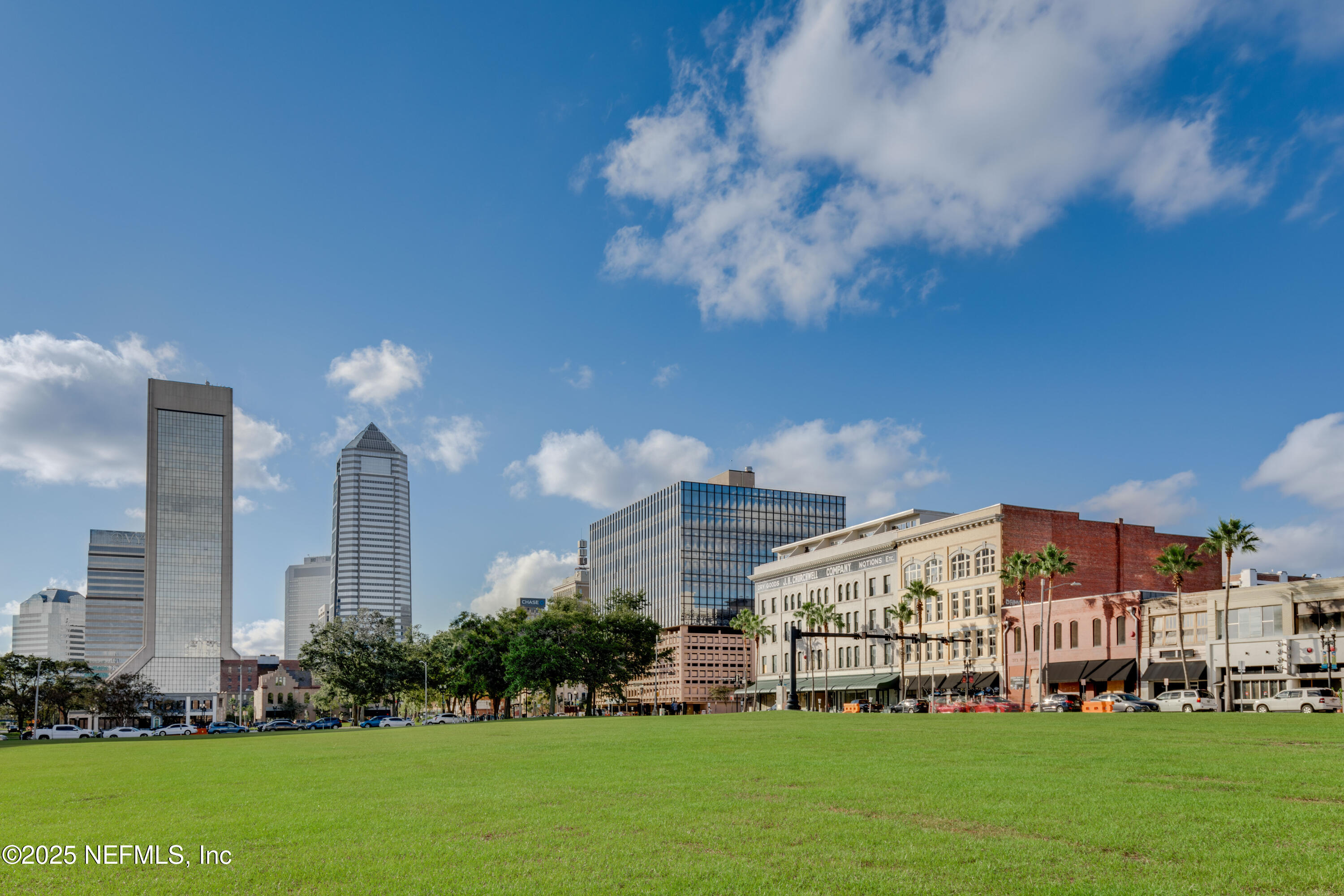330 West 26th Street Jacksonville, FL 32206 - Photo 21 of 27 a view of a big building with a big yard and large trees