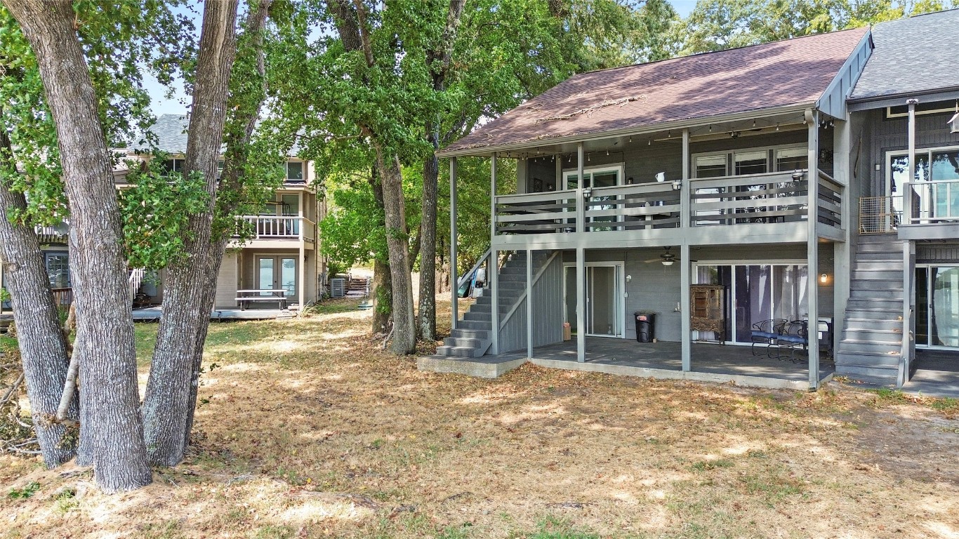 344 Peach Island Trinity, TX 75862 - Photo 14 of 15 a front view of a house with a porch