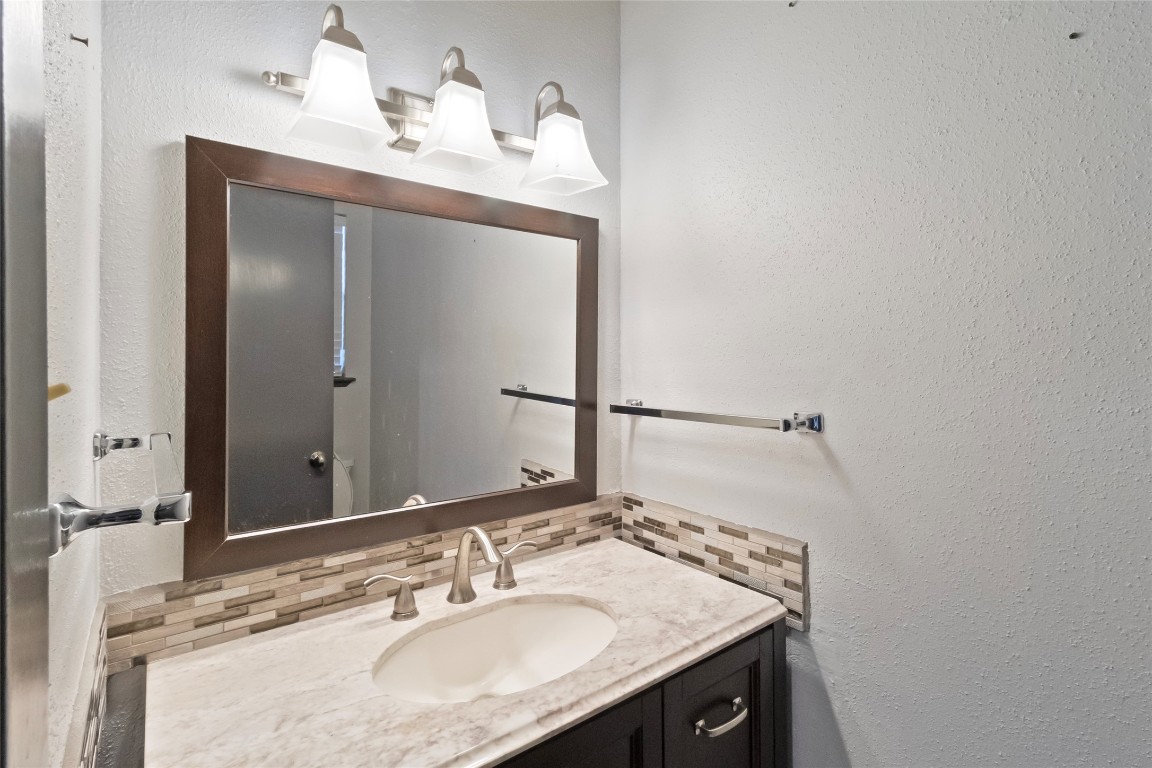 344 Peach Island Trinity, TX 75862 - Photo 7 of 15 a bathroom with a sink and a mirror