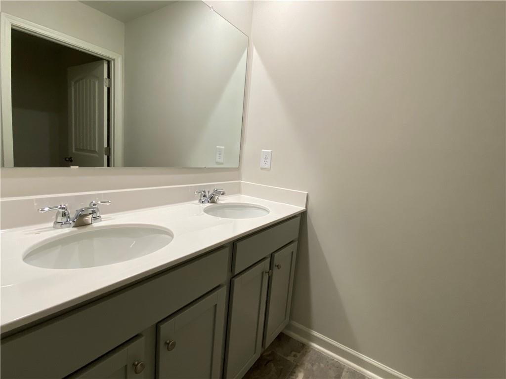 2715 Piper Drive Atlanta, GA 30331 - Photo 16 of 21 a bathroom with a sink and a mirror