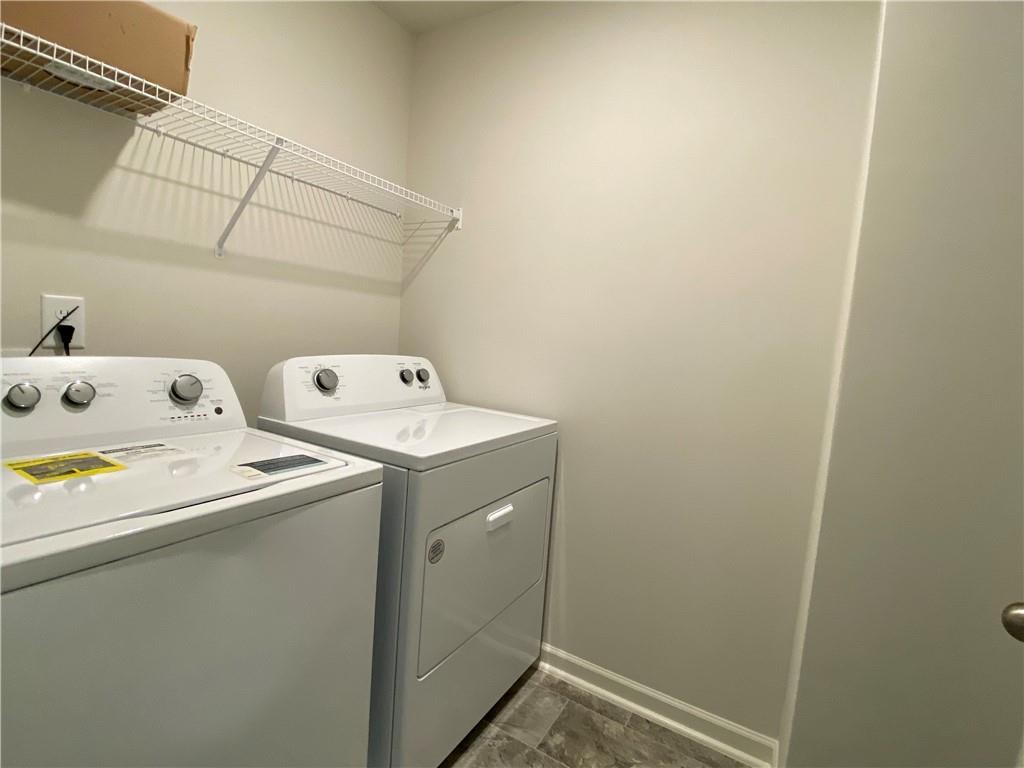 2715 Piper Drive Atlanta, GA 30331 - Photo 18 of 21 a utility room with dryer and washer