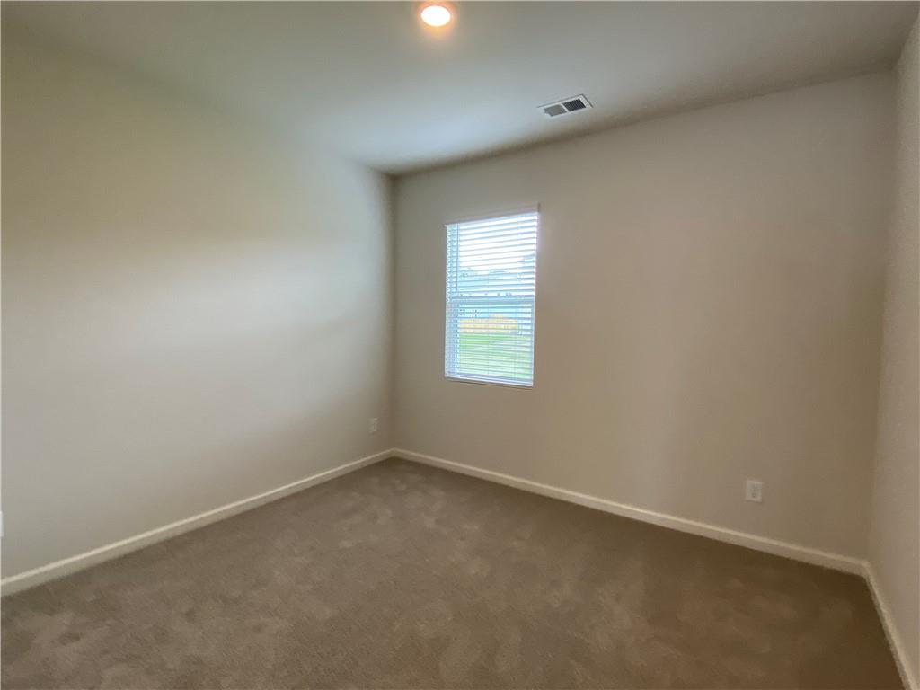2715 Piper Drive Atlanta, GA 30331 - Photo 7 of 21 an empty room with a window