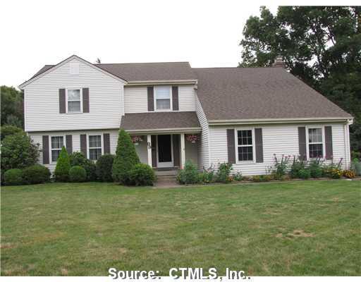 89 Crest Road Southington, CT 06489 - Photo 1 of 1 a front view of a house with a garden