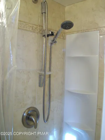 a bathroom with a toilet and a sink