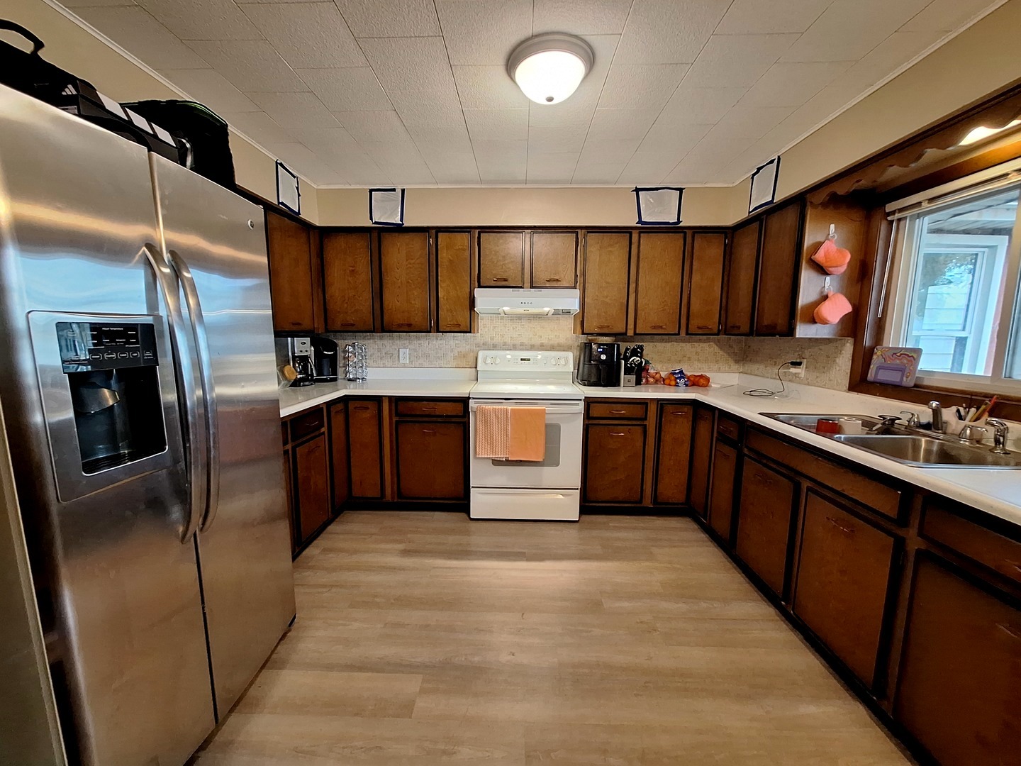 200 Oregon Street Troy Grove, IL 61372 - Photo 14 of 34 a kitchen with stainless steel appliances granite countertop a stove a sink dishwasher a refrigerator and a oven