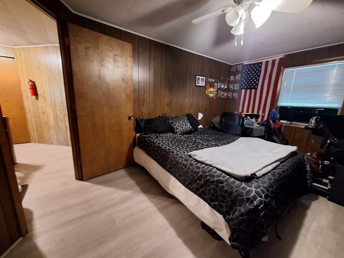 200 Oregon Street Troy Grove, IL 61372 - Photo 21 of 34 a bed sitting in a spacious bedroom next to a window