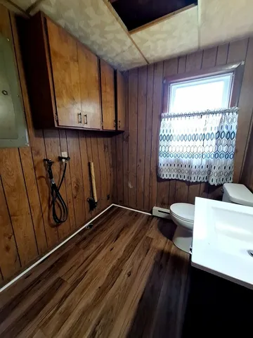 a view of a room with racks on the wall