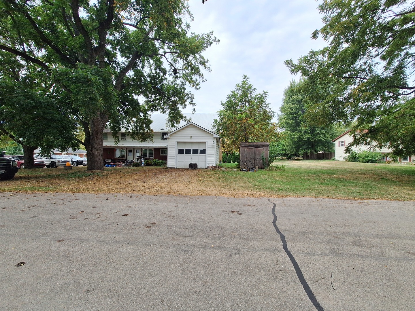 200 Oregon Street Troy Grove, IL 61372 - Photo 34 of 34 a front view of a house with a yard and garage