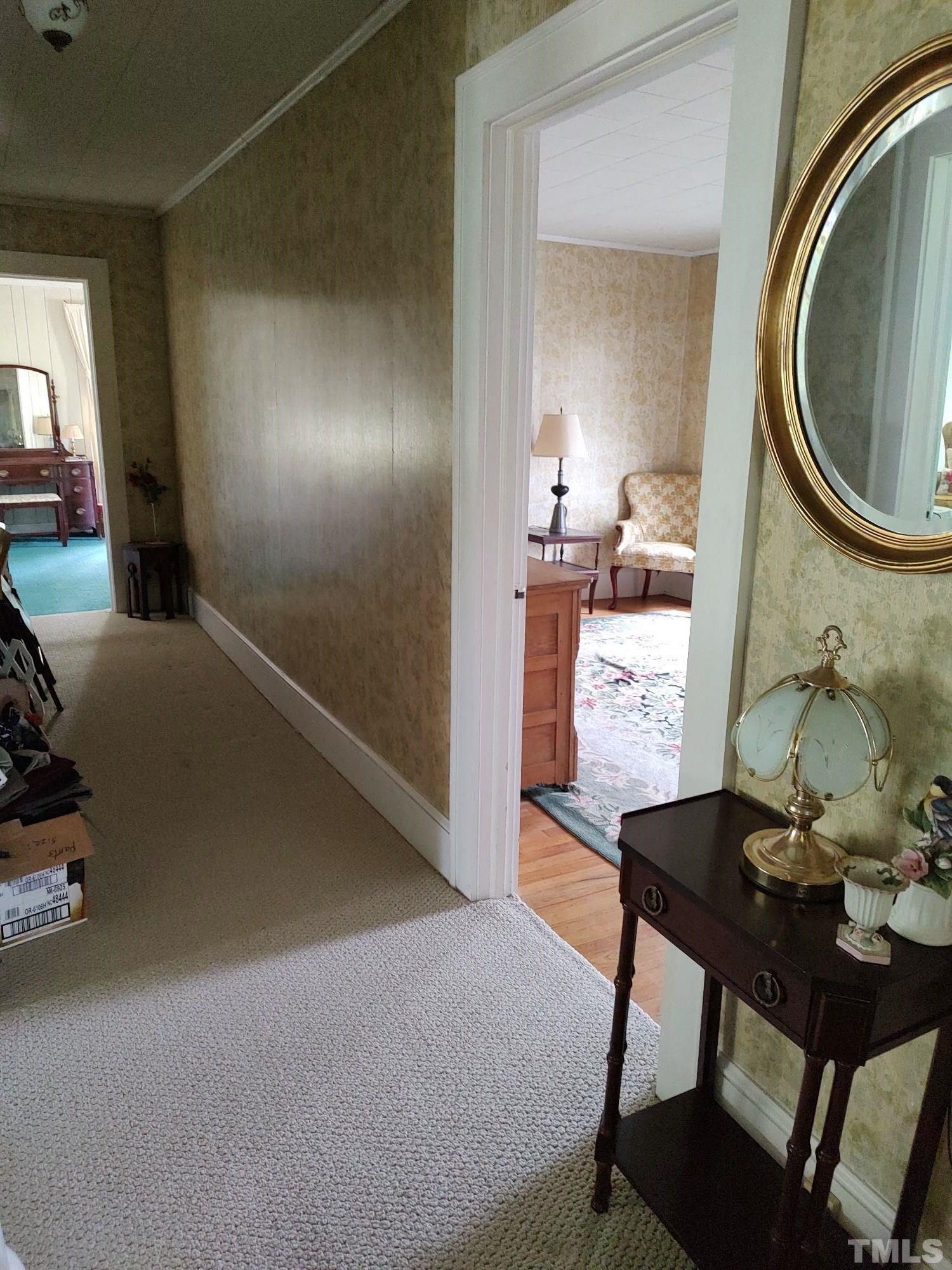 8727 Peacock Road Whiteville, NC 28472 - Photo 22 of 25 a workspace with furniture and mirror