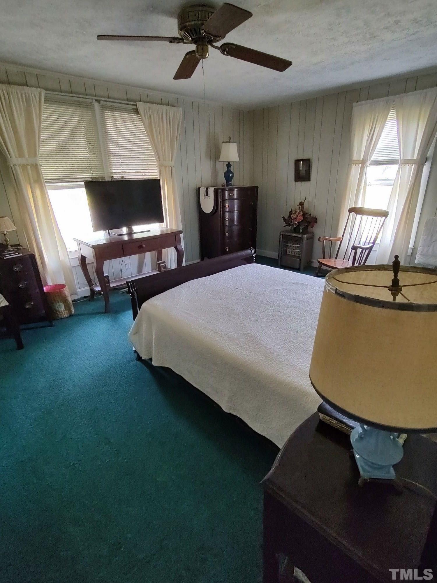 8727 Peacock Road Whiteville, NC 28472 - Photo 24 of 25 a bed room with furniture and a window