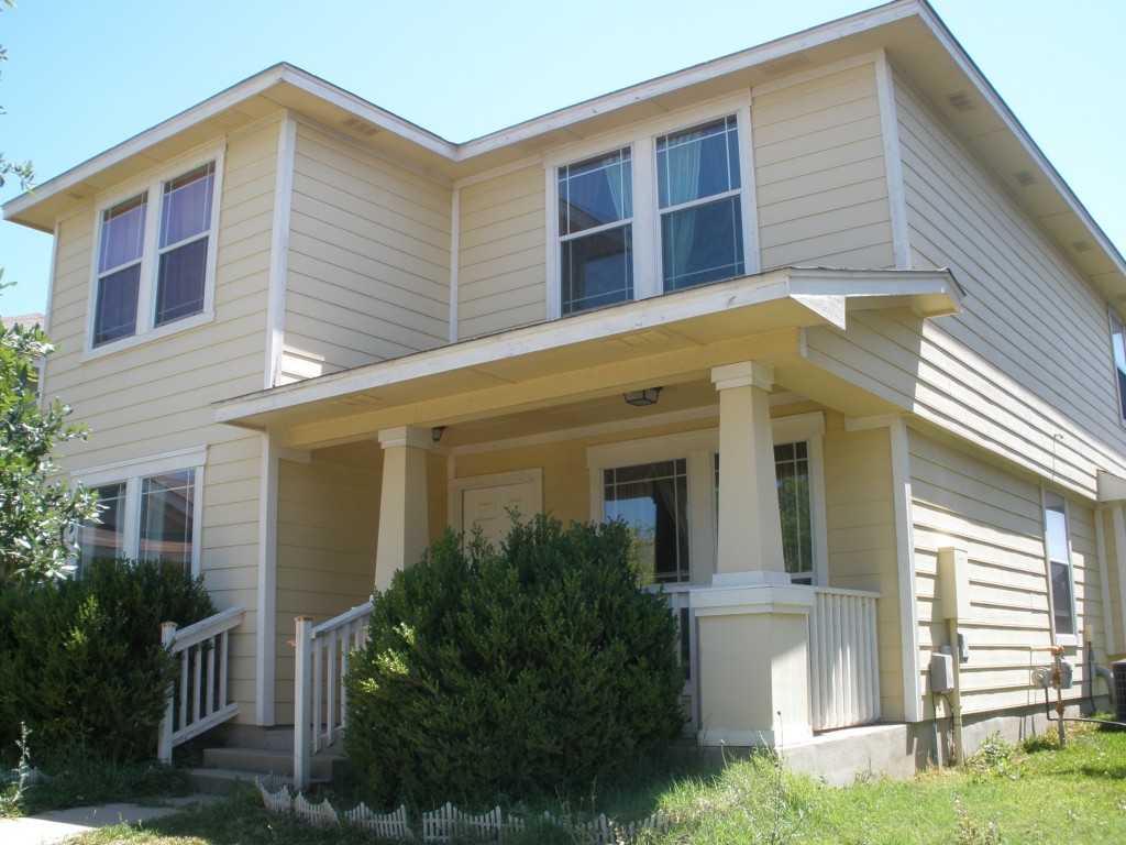 202 Crockett Road Cedar Park, TX 78613 - Photo 1 of 1 a front view of a house with a yard and garage