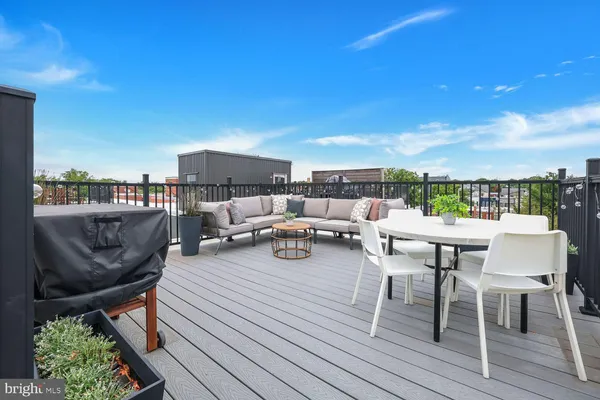 a view of a terrace with seating area