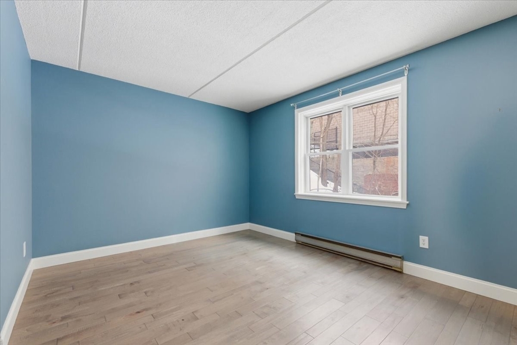 7A Eugene Circle, Unit B Boston, MA 02130 - Photo 20 of 42 an empty room with a window
