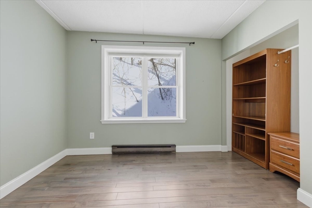 7A Eugene Circle, Unit B Boston, MA 02130 - Photo 22 of 42 a view of room with window and closet