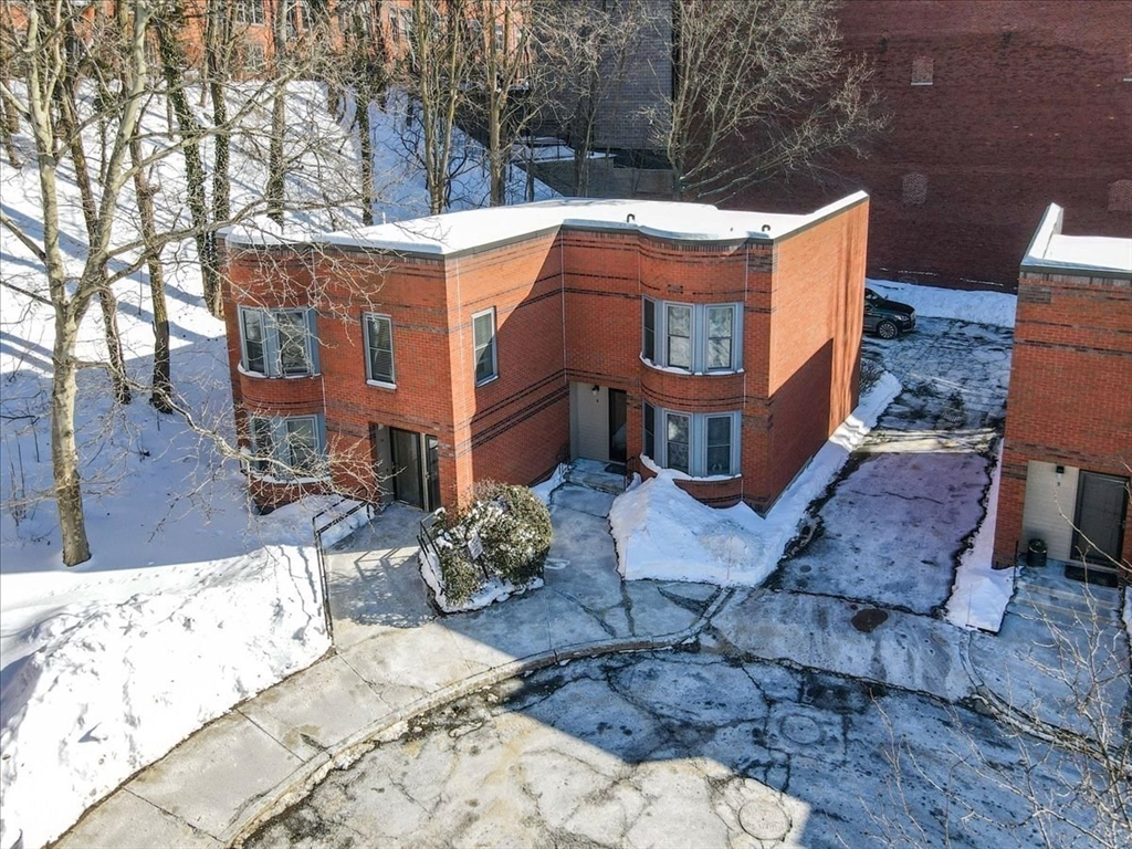 7A Eugene Circle, Unit B Boston, MA 02130 - Photo 35 of 42 a view of a house with a yard