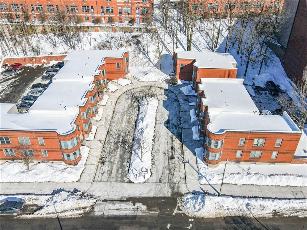 7A Eugene Circle, Unit B Boston, MA 02130 - Photo 40 of 42 an aerial view of residential houses with outdoor space