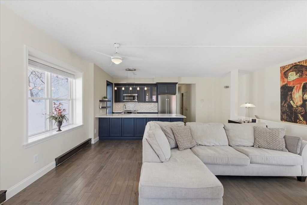 7A Eugene Circle, Unit B Boston, MA 02130 - Photo 9 of 42 a living room with furniture and a wooden floor