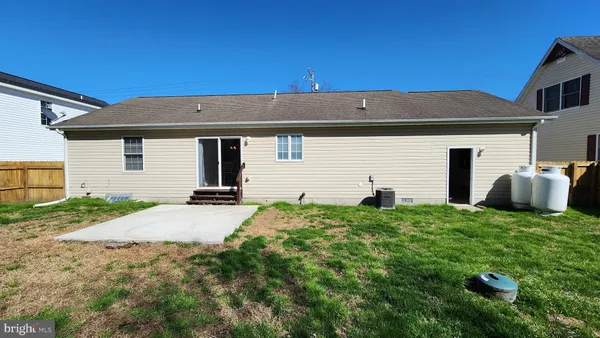 a house view with a backyard space