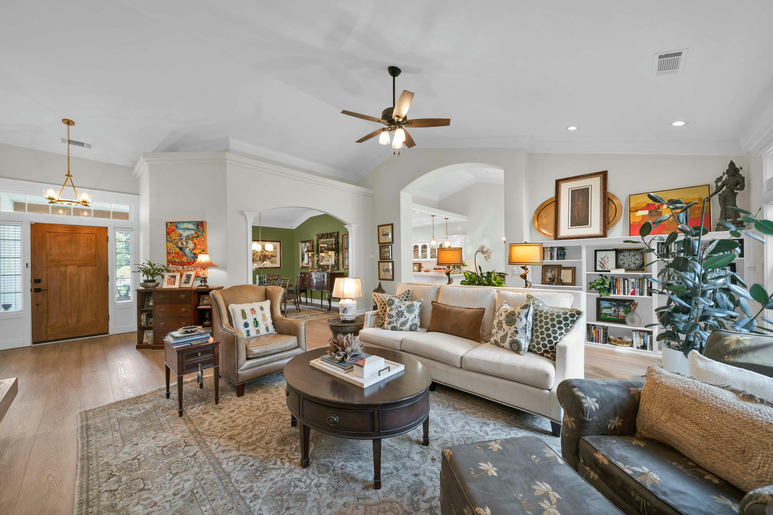 4045 Mt Whitney Way Redding, CA 96002 - Photo 14 of 78 a living room with furniture kitchen view and a chandelier