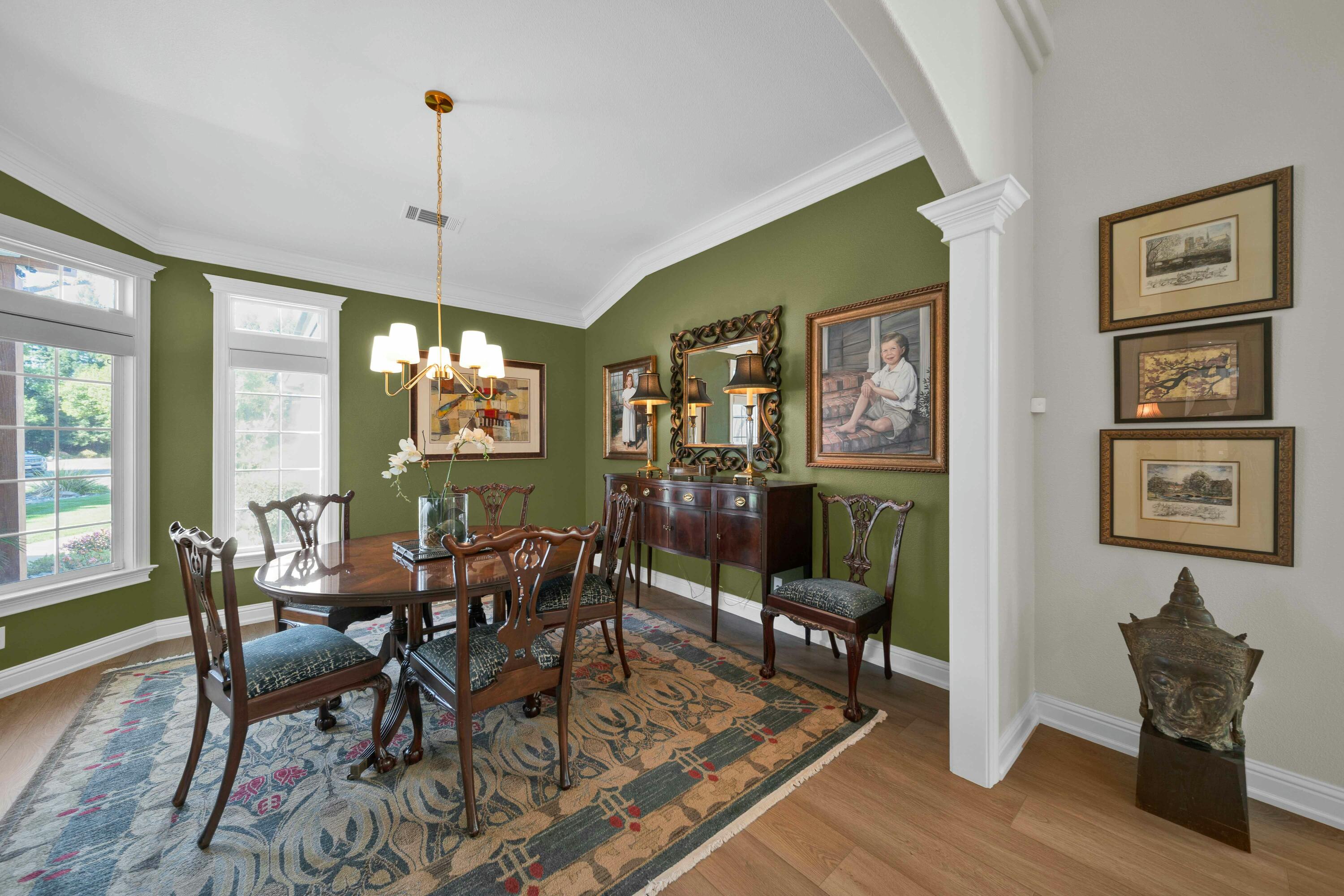 4045 Mt Whitney Way Redding, CA 96002 - Photo 18 of 78 a view of a dining room with furniture window and wooden floor