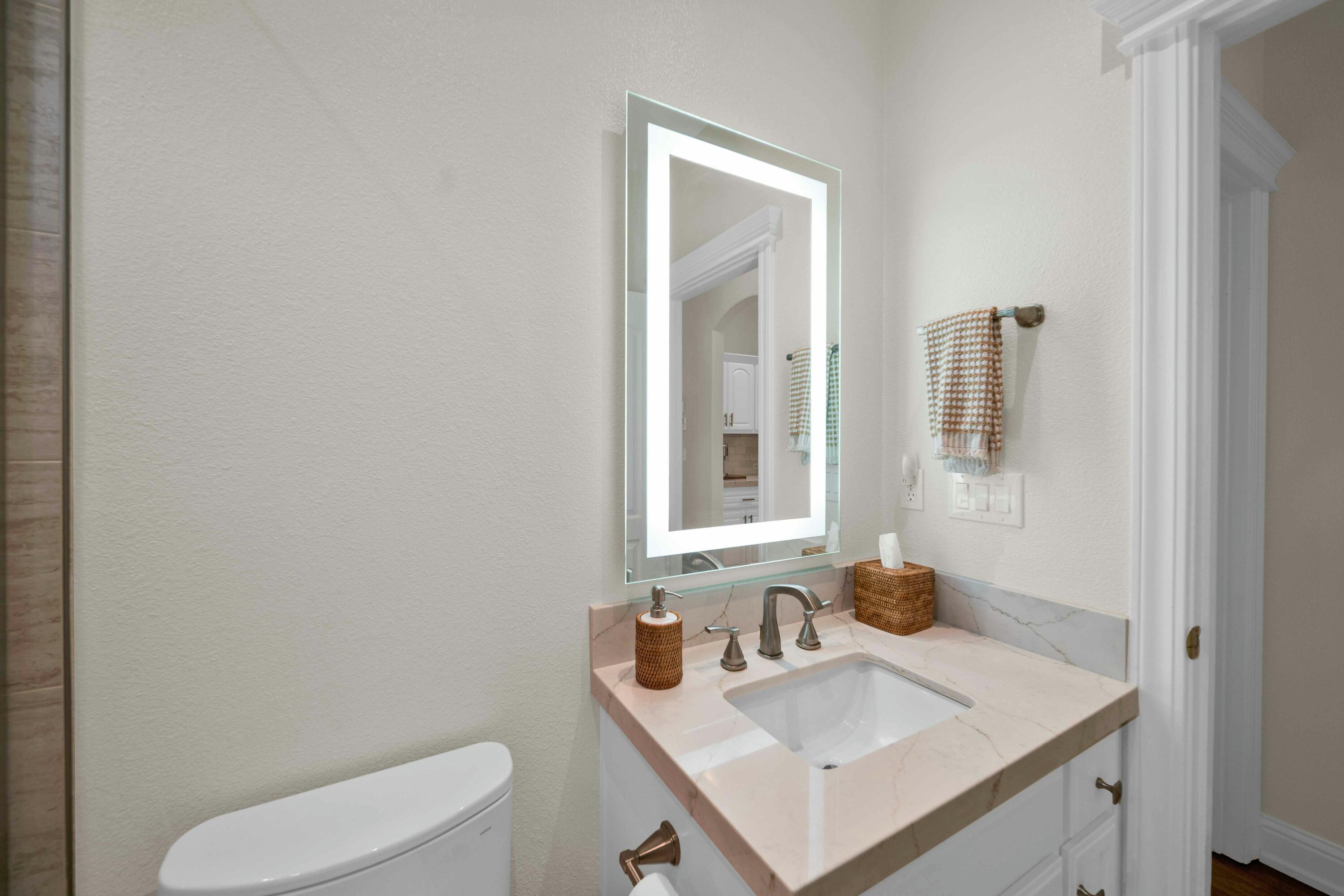 4045 Mt Whitney Way Redding, CA 96002 - Photo 39 of 78 a bathroom with a sink toilet and mirror