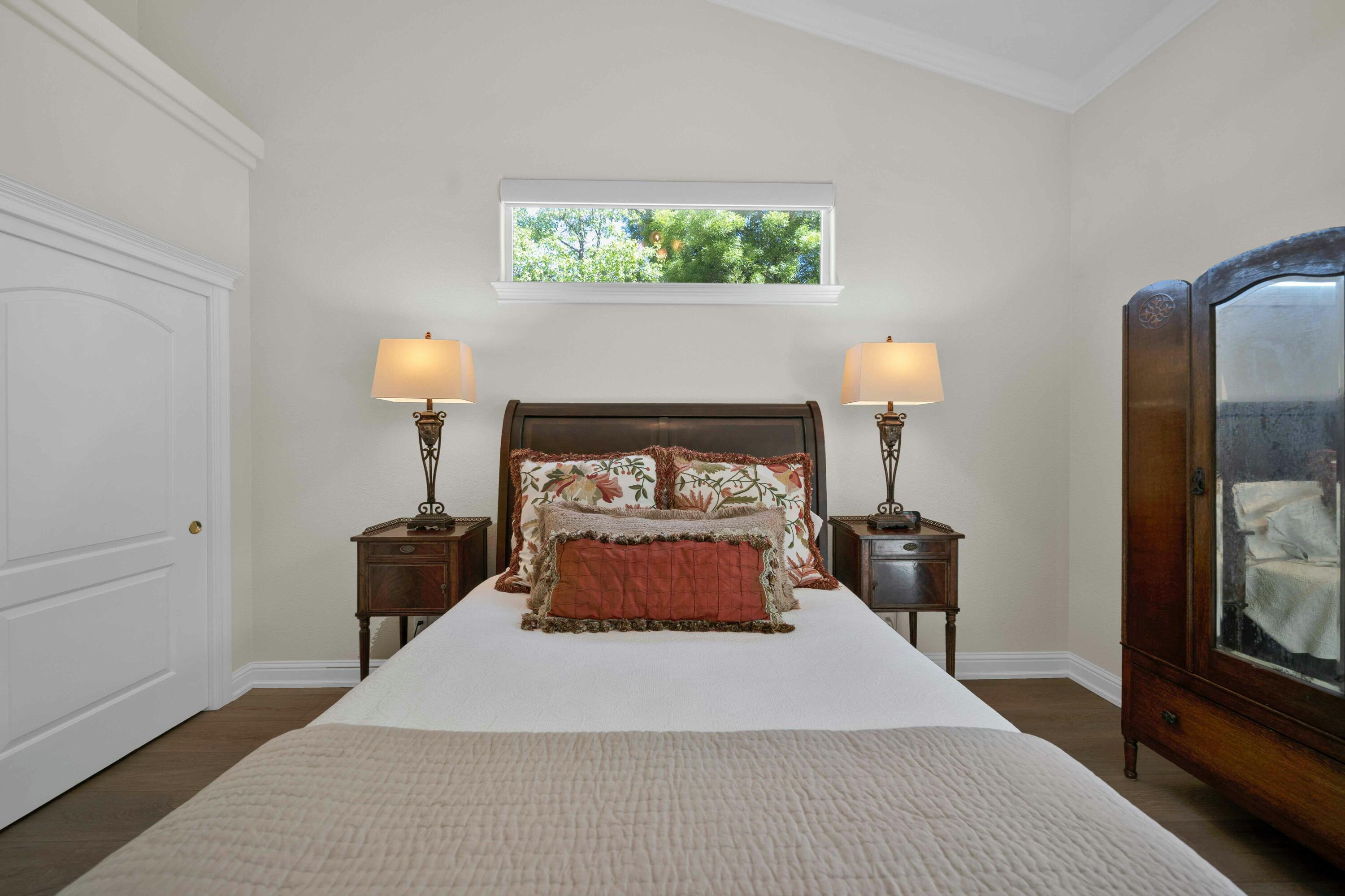 4045 Mt Whitney Way Redding, CA 96002 - Photo 41 of 78 a room with a bed and a fireplace