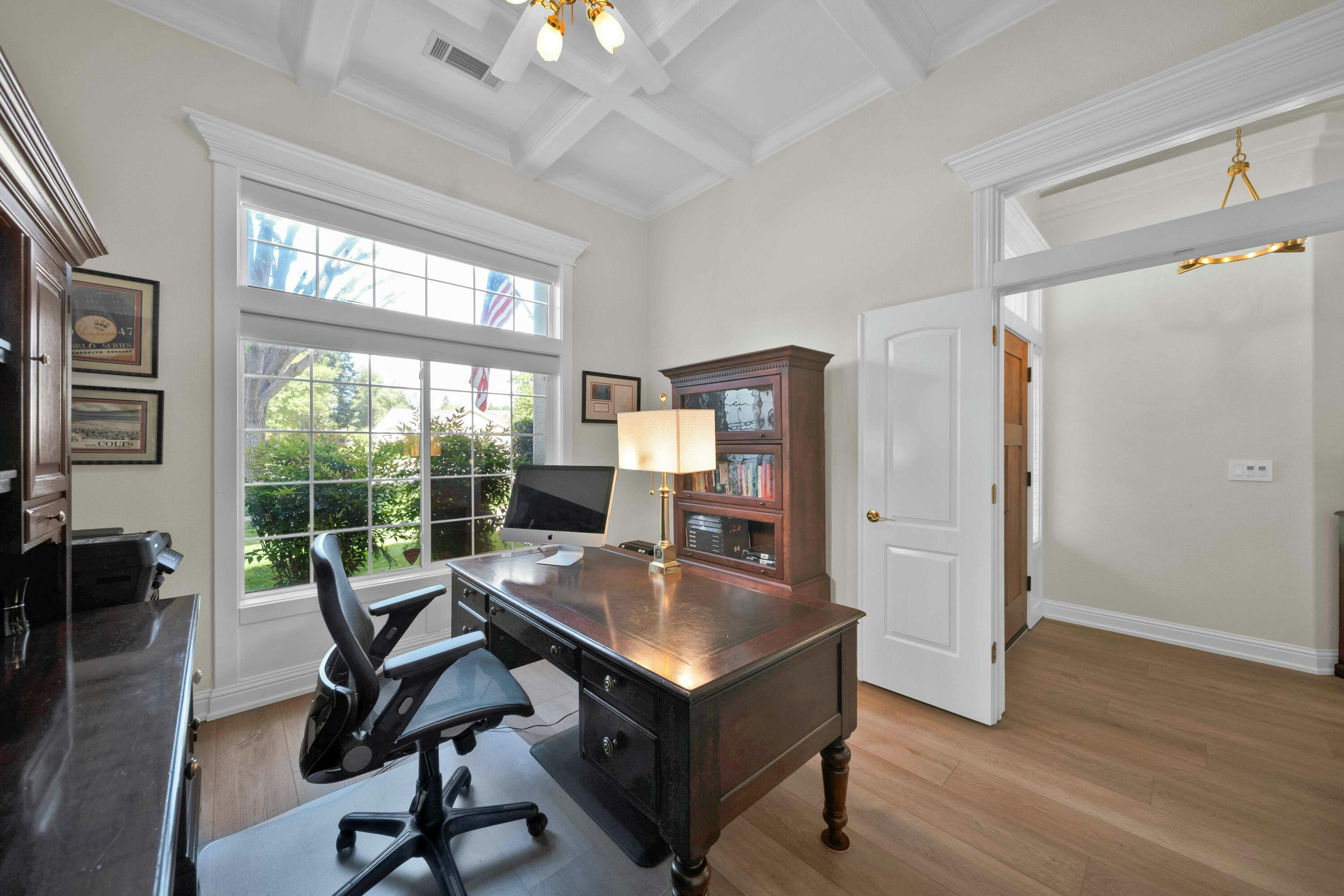 4045 Mt Whitney Way Redding, CA 96002 - Photo 44 of 78 a view of a workspace with furniture and a window