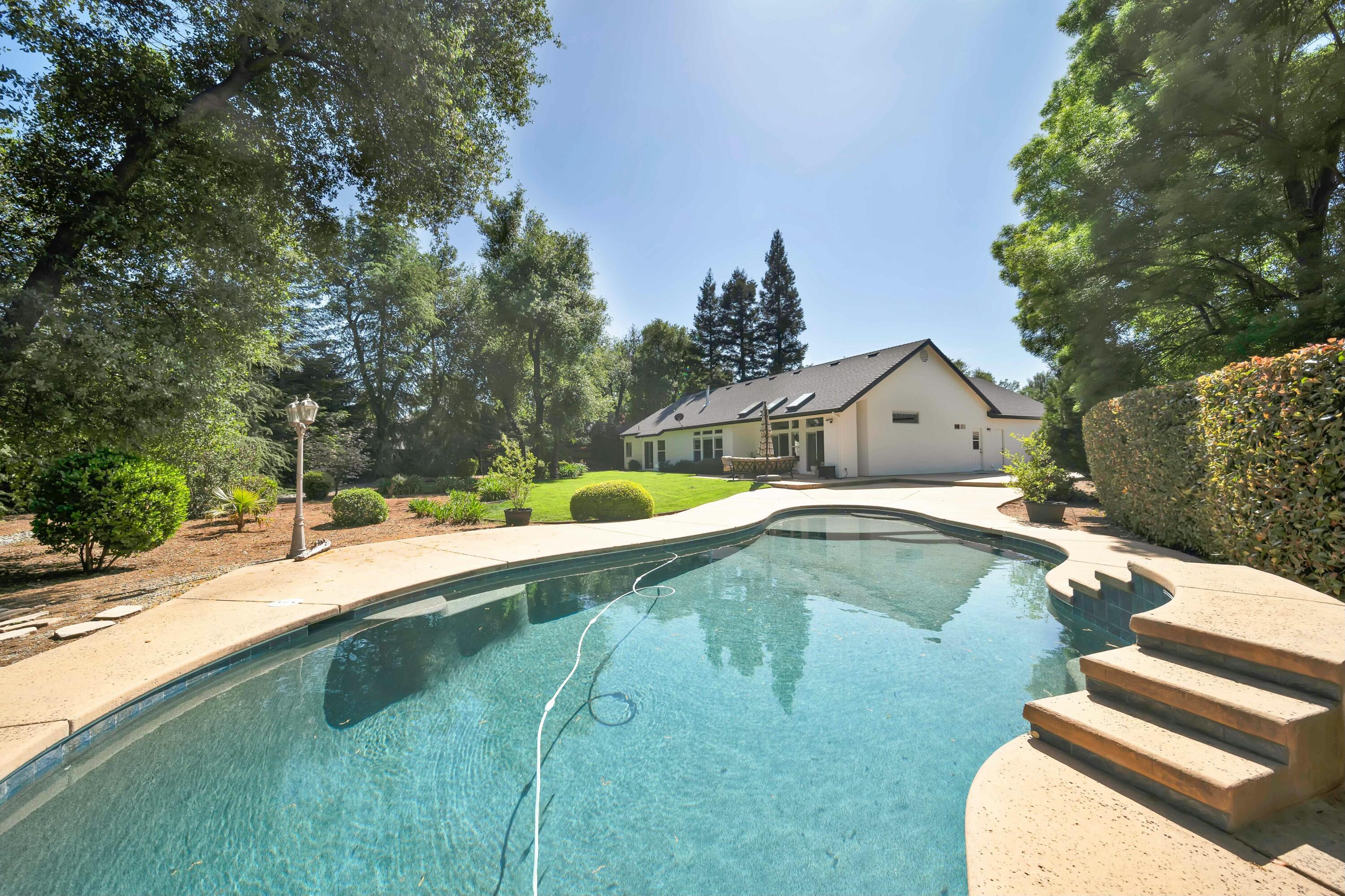 4045 Mt Whitney Way Redding, CA 96002 - Photo 57 of 78 a view of swimming pool with backyard