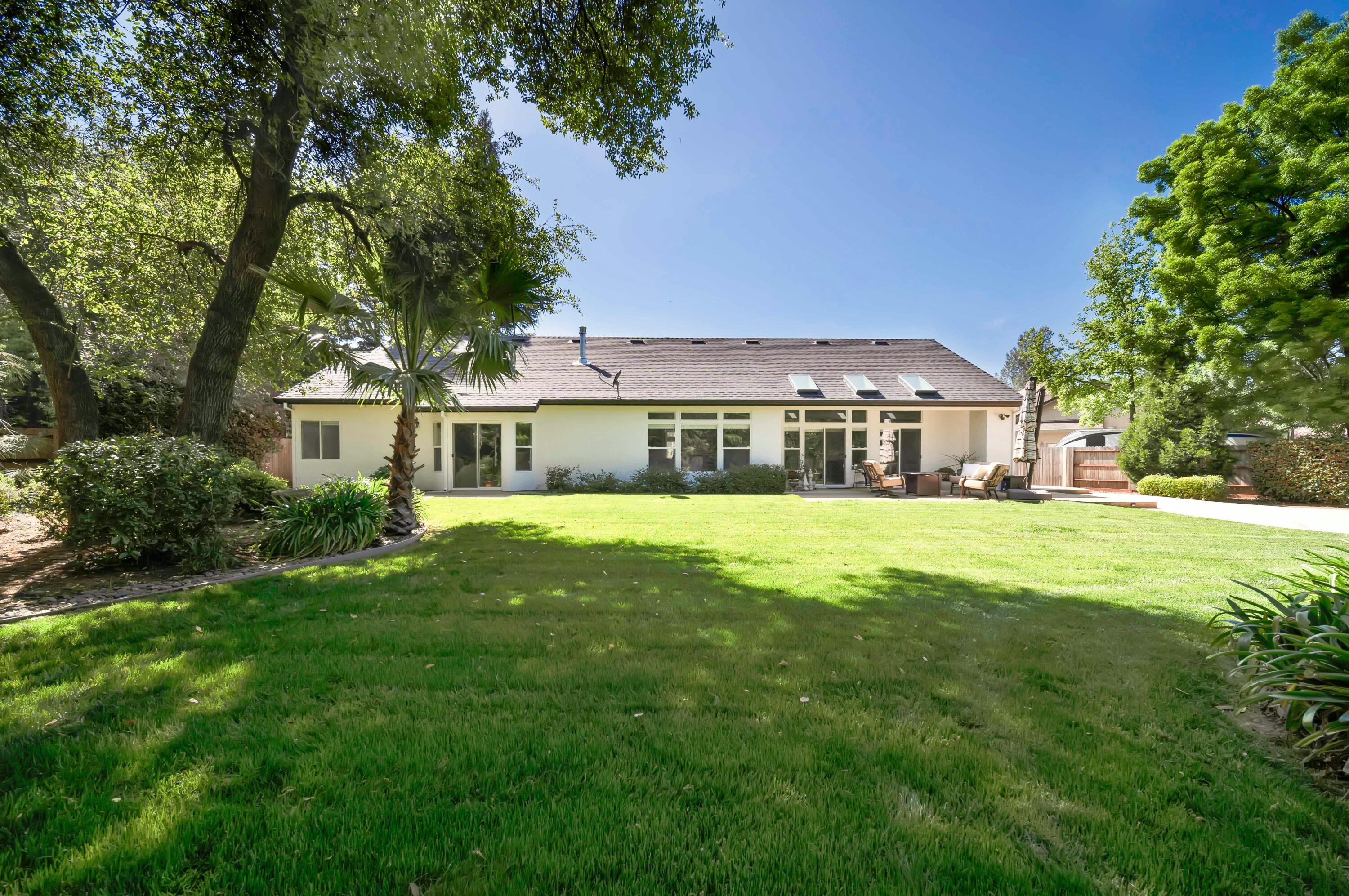 4045 Mt Whitney Way Redding, CA 96002 - Photo 64 of 78 a front view of a house with a yard