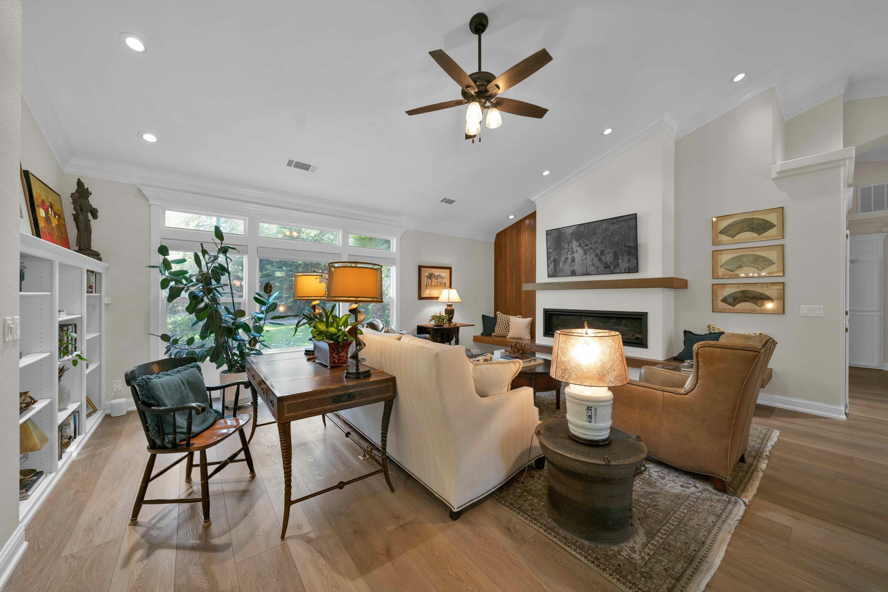 4045 Mt Whitney Way Redding, CA 96002 - Photo 8 of 78 a living room with furniture and a fireplace