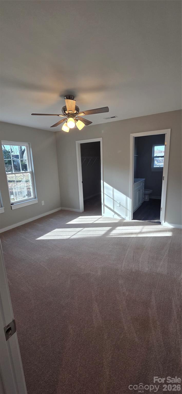 513 Lincolnton Road Salisbury, NC 28144 - Photo 9 of 11 a view of a livingroom with a ceiling fan and window