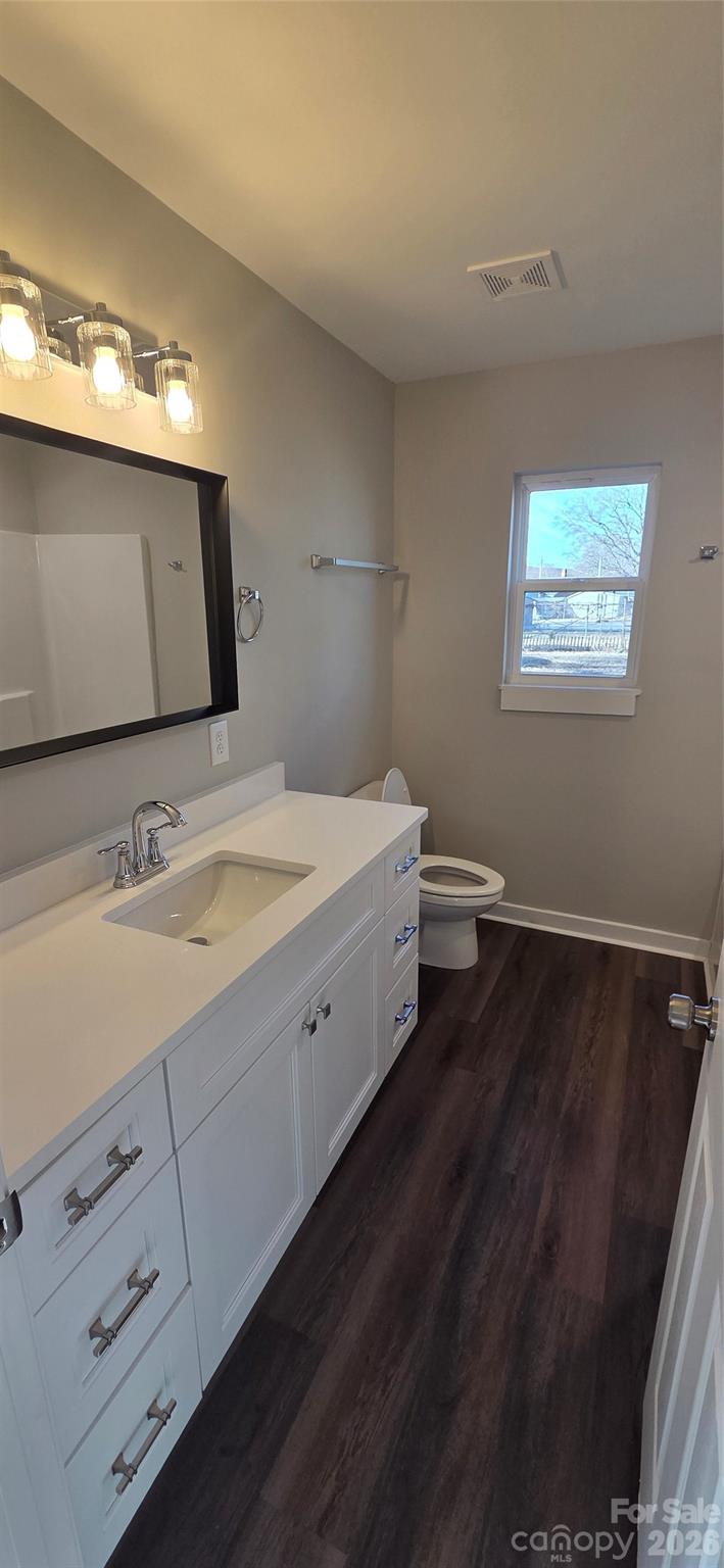513 Lincolnton Road Salisbury, NC 28144 - Photo 10 of 11 a spacious bathroom with a double vanity sink and a mirror