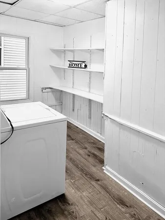 a utility room with washer and dryer